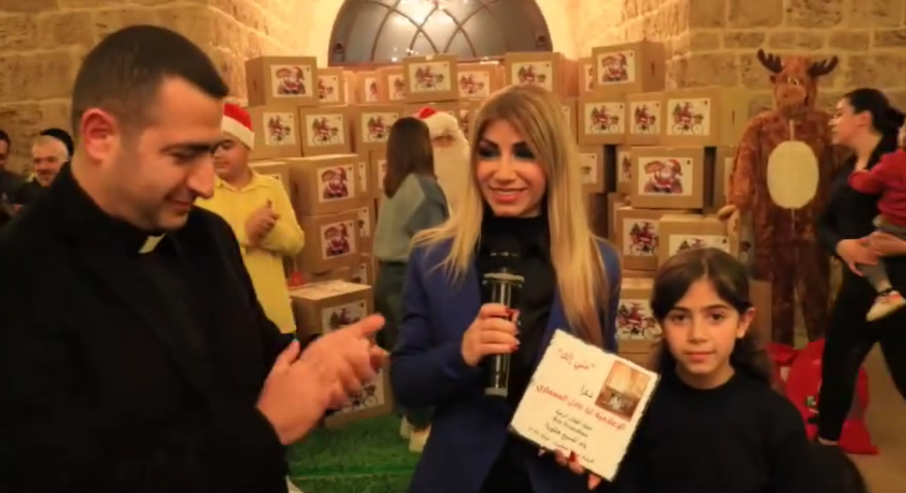 Father Charbel Al Khoury Honors the Media Officer at MECC, the Director of the Platform of the Word and the Coordinator of the Church and Media Relations at MECC