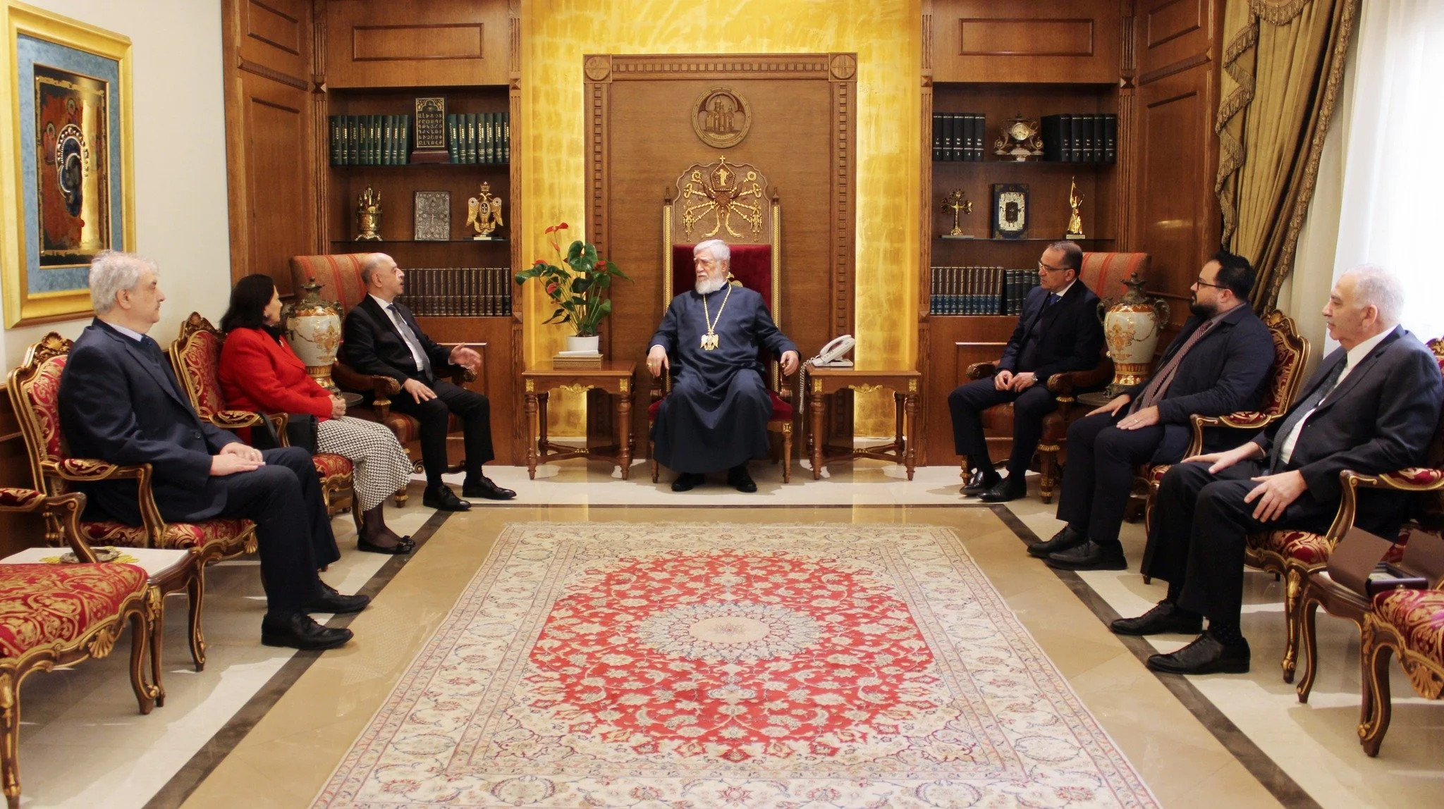 Reverend Dr. Paul Haidostian presents the special commemorative medal plaque of the centennial of the UAECNE to His Holiness Catholicos Aram I