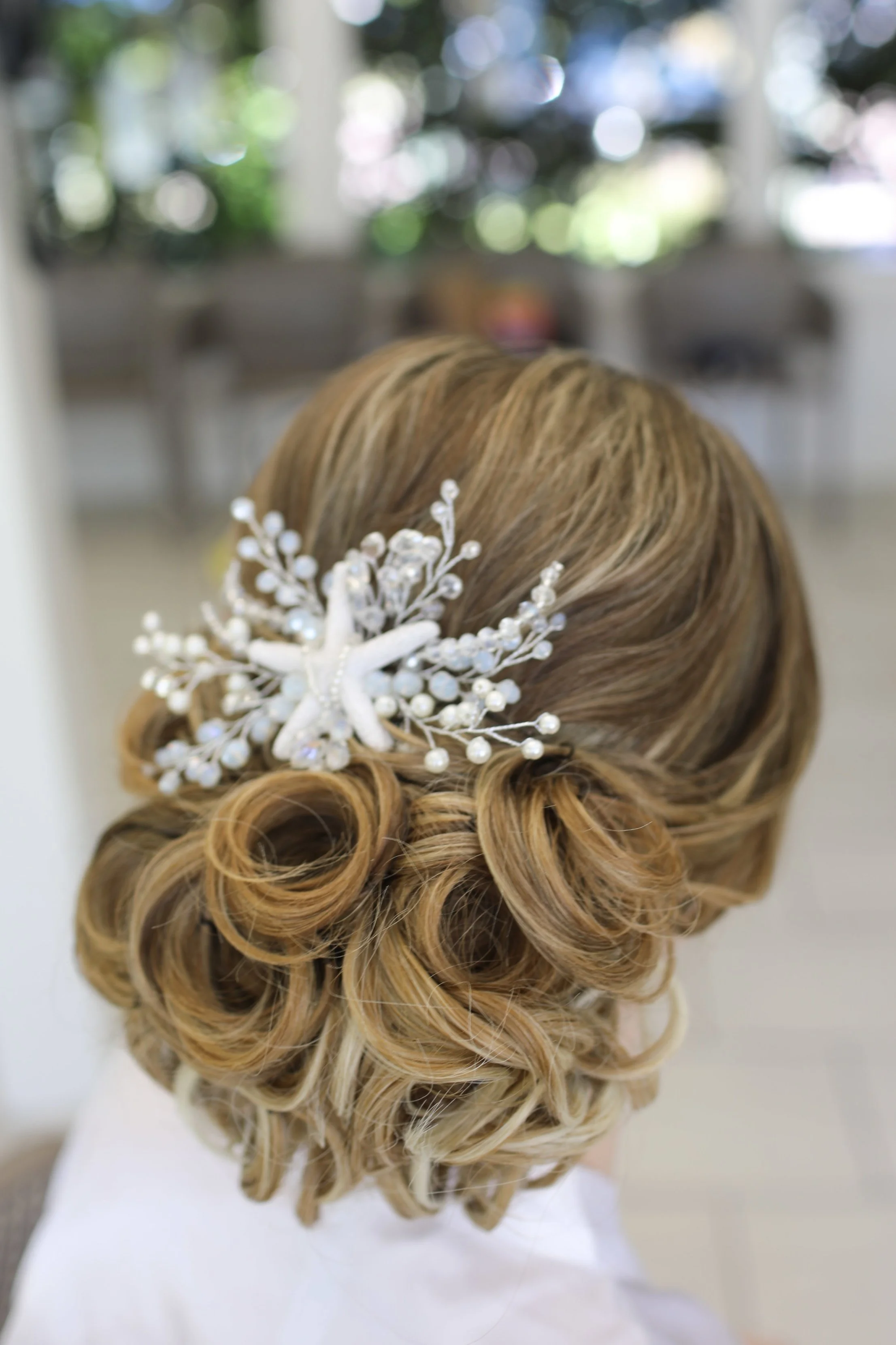 Bridal updo with starfish