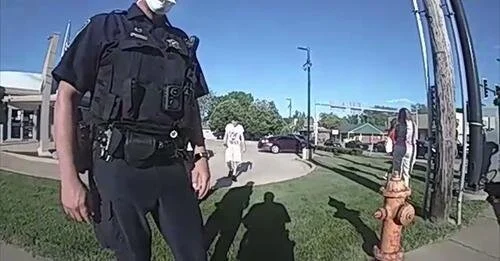 Police Officers Debate Whether To Ticket Driver That Struck Woman On Bike