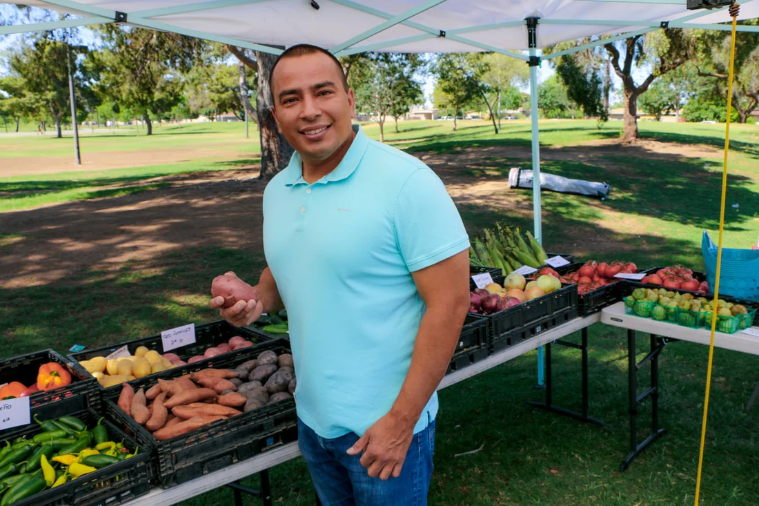 Phoenix Councilman Daniel Valenzuela at the Maryvale El Oso Park Farmers Market