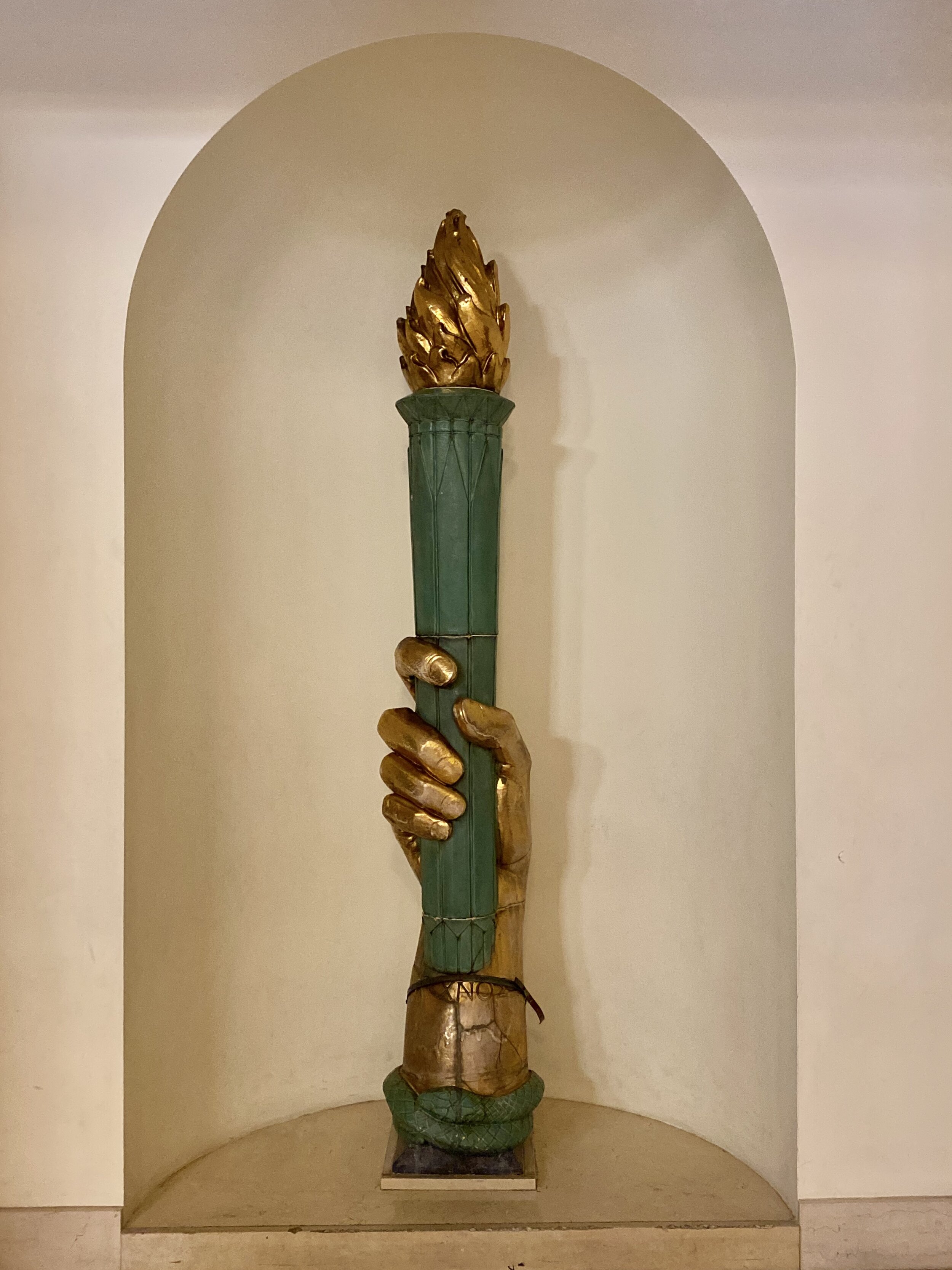Original "Torch of Knowledge" that used to be on top of the roof.