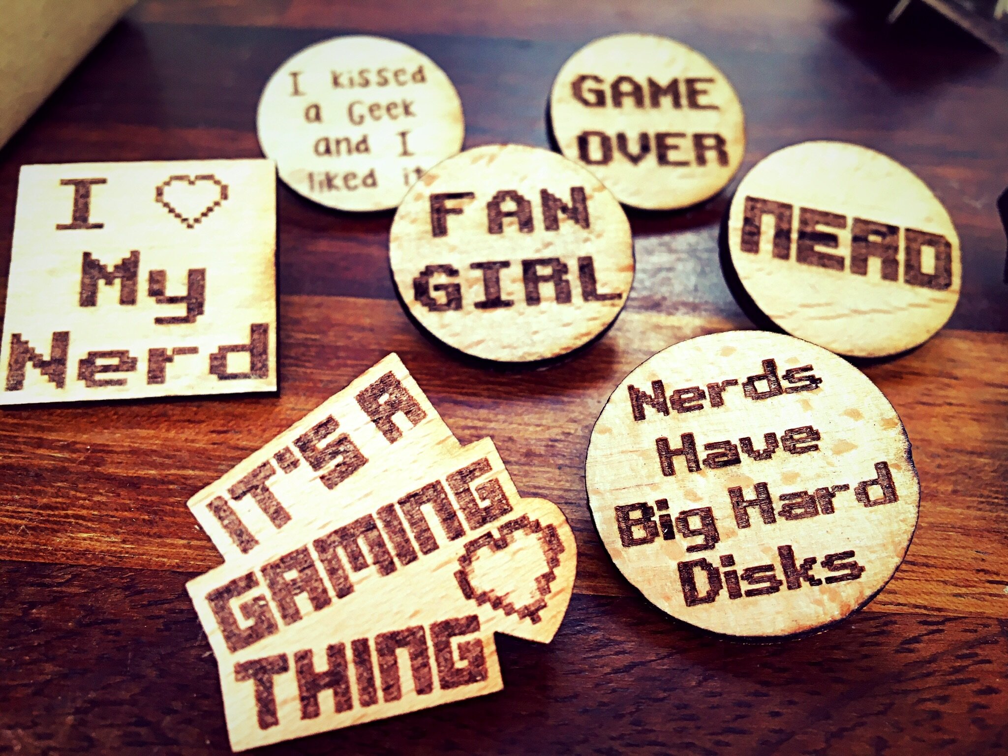  We love nerds solid wood pin badges at Harty’s 