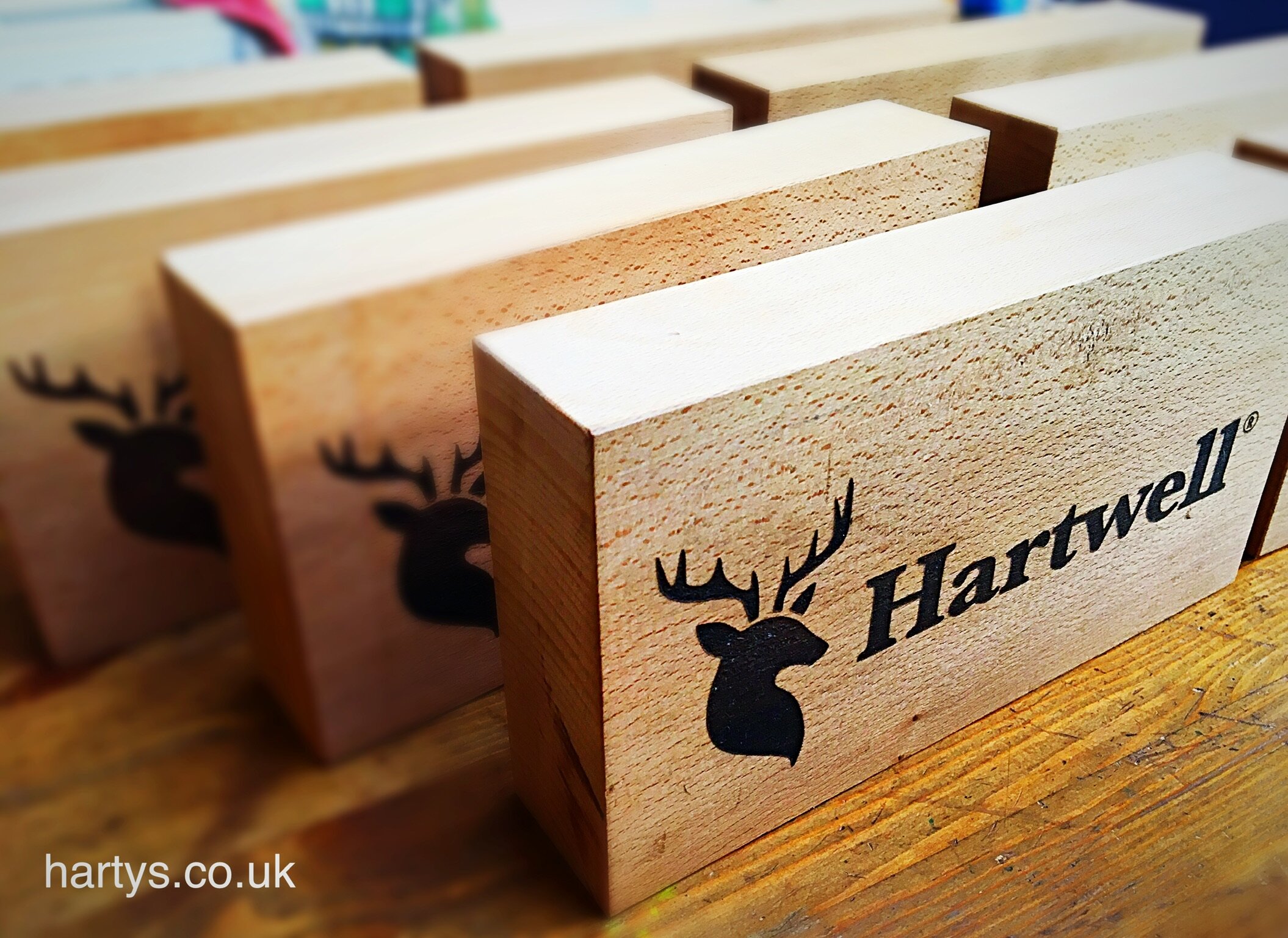 Hartwell Country Wear  stock their clothing in stores around the UK and Canada. They wanted a stand out item to sit alongside their clothing range that represents their brand. These solid wood blocks made from reclaimed beech and make a beautiful statement.