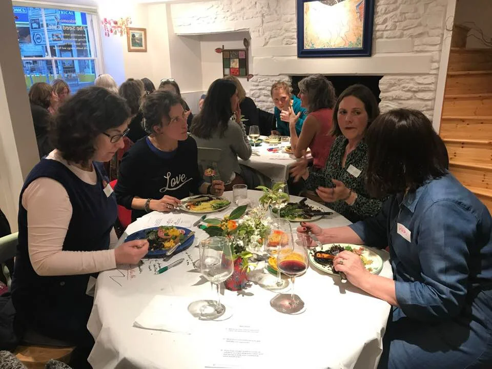 Women enjoying their meal.