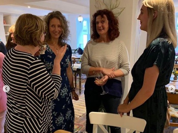 Women sharing stories about their lives.