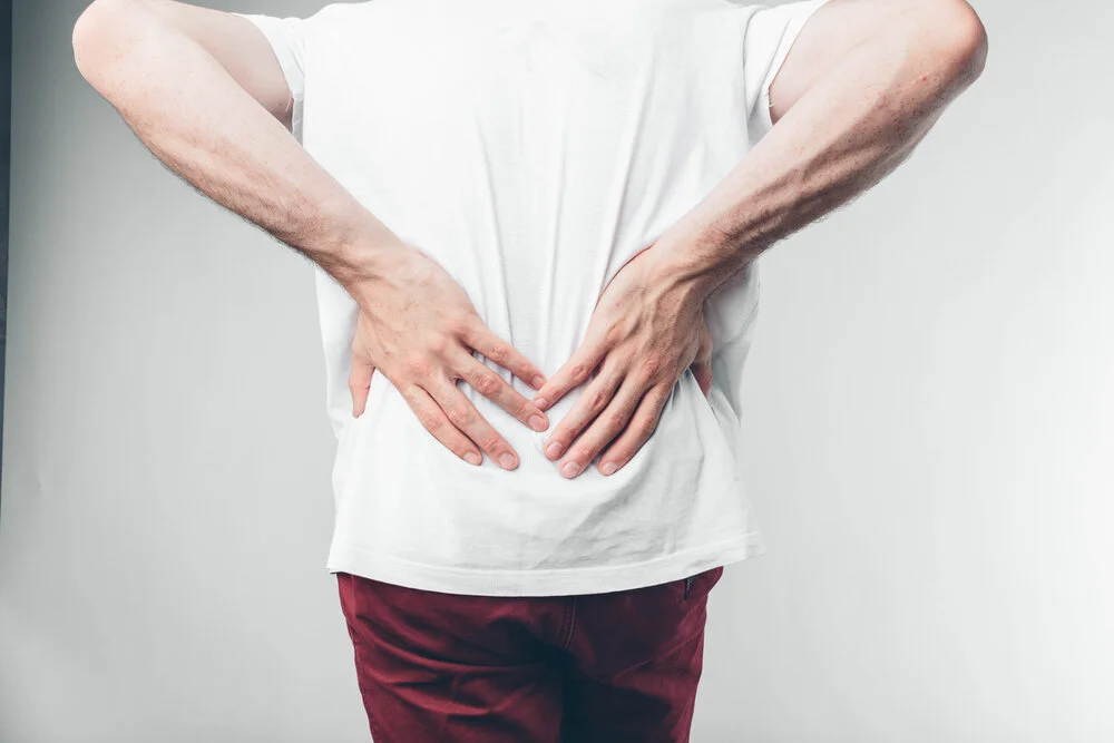 A man holding his penis with on the white background.jpg