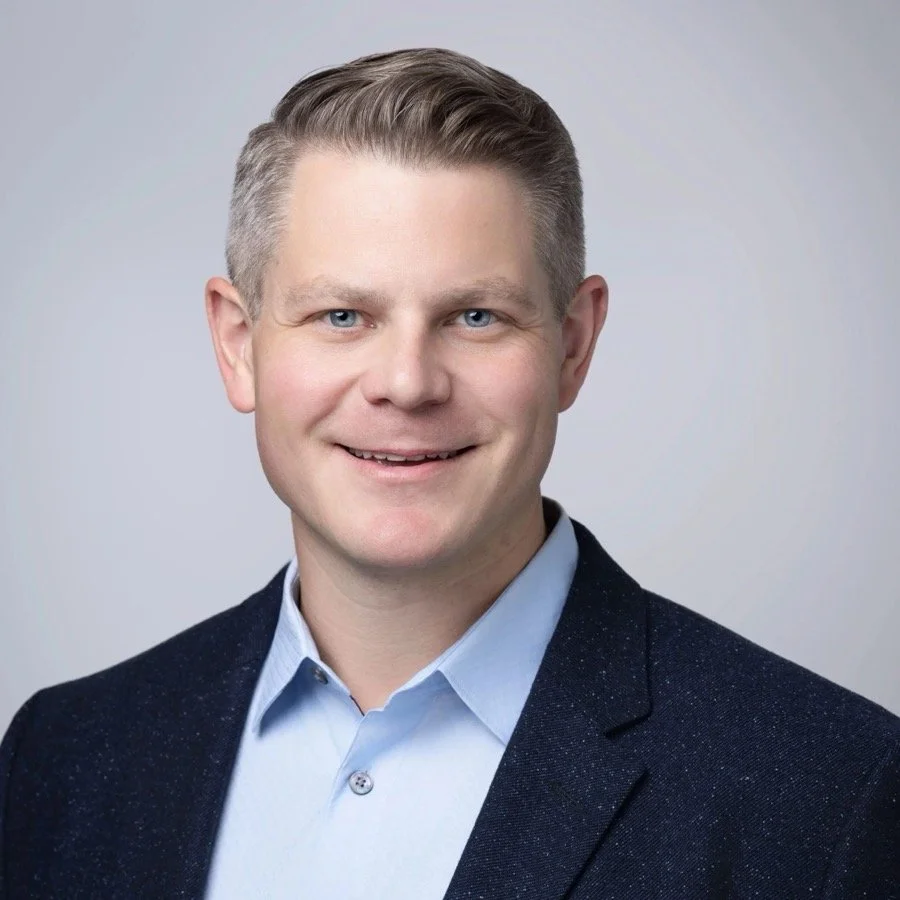 Headshot of Dr. Jacob Caylor, double board-certified pain management physician serving Midwest City