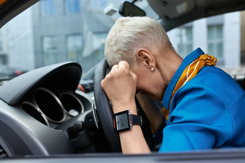 Woman in pain after car accident in need of a car accident doctor in Quail Creek Oklahoma City
