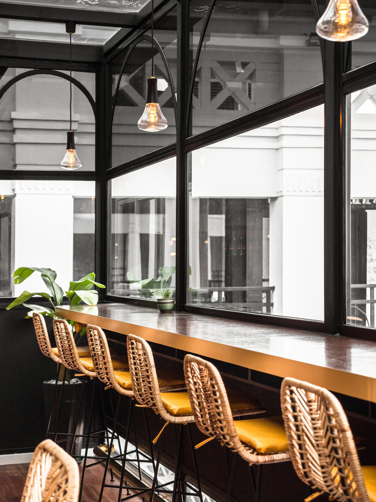   The spatial planning considers extroverts who prefer to sit by the bar to chat with the baristas while the introverts can sit by the bay window facing the view.  