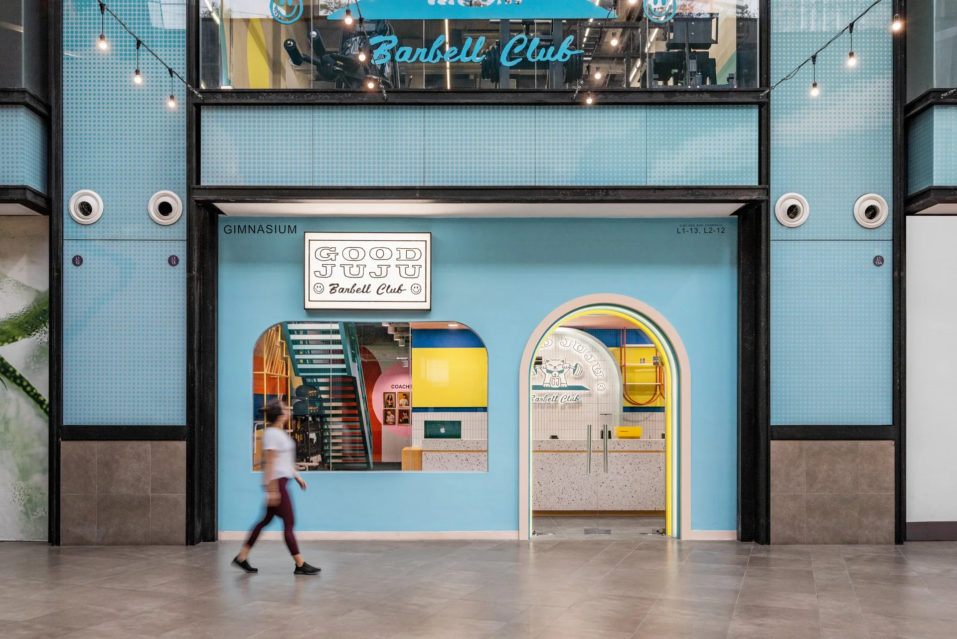  The bright blue facade gives passers by a peek into the funky, fun, and fresh interiors within. 