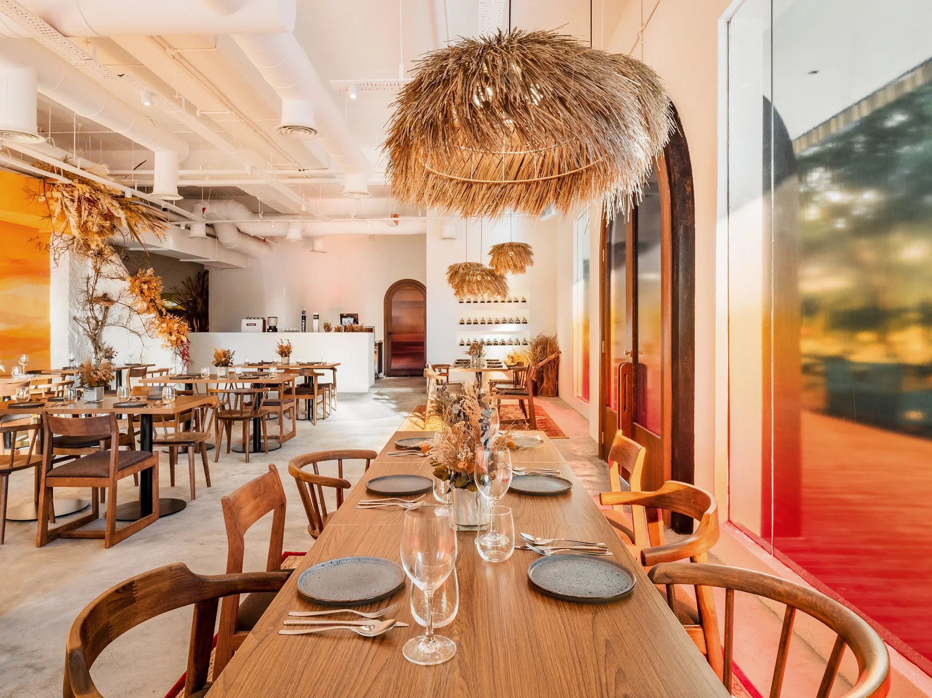  With clever use of ombre-toned film, Nevermore Group takes advantage of the many shopfront windows at Cueva to create an atmosphere of perpetual sunset. 