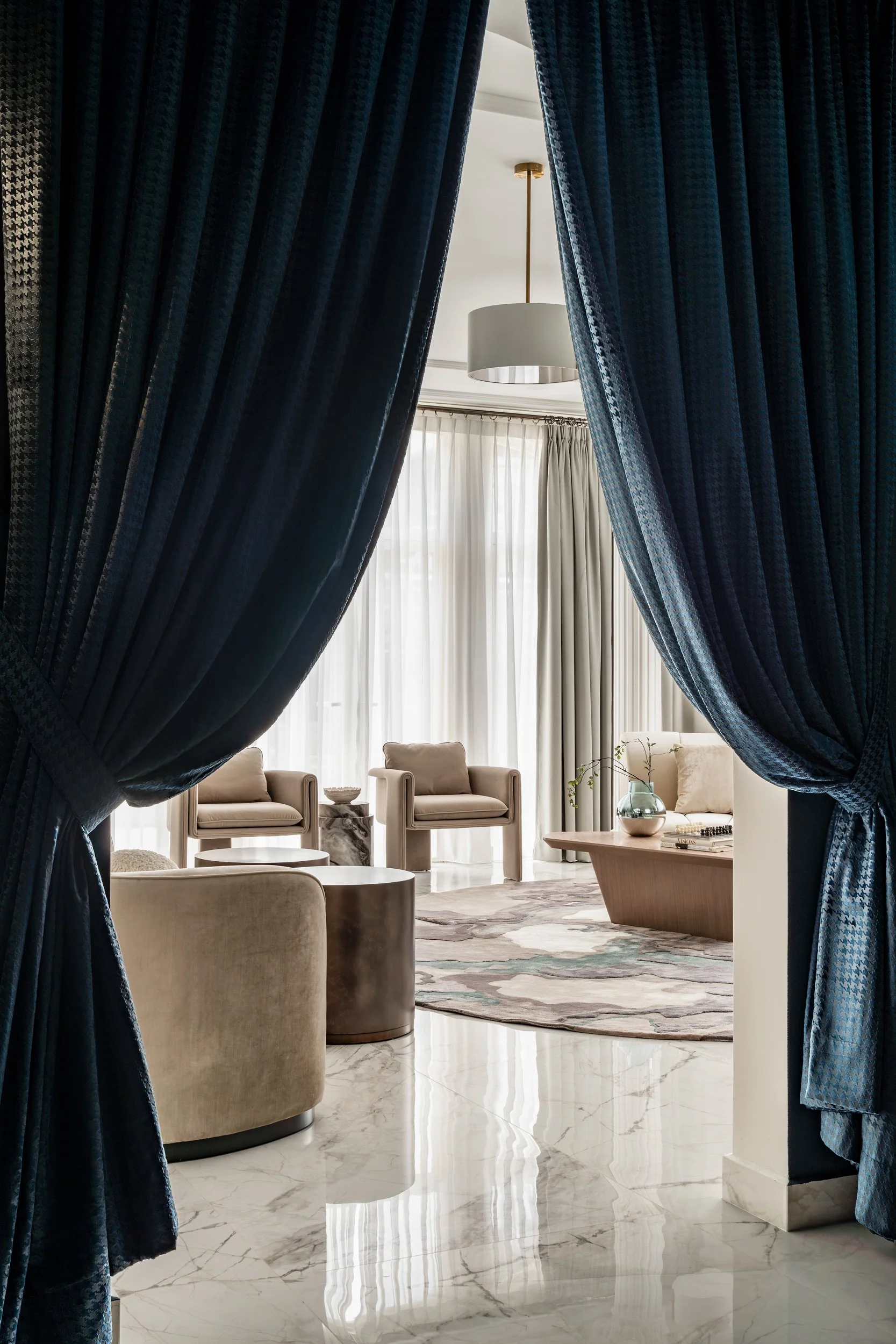  Here, darkness reigns and rugged textures play beneath dim lights - a dramatic contrast to the room you've just left behind.  