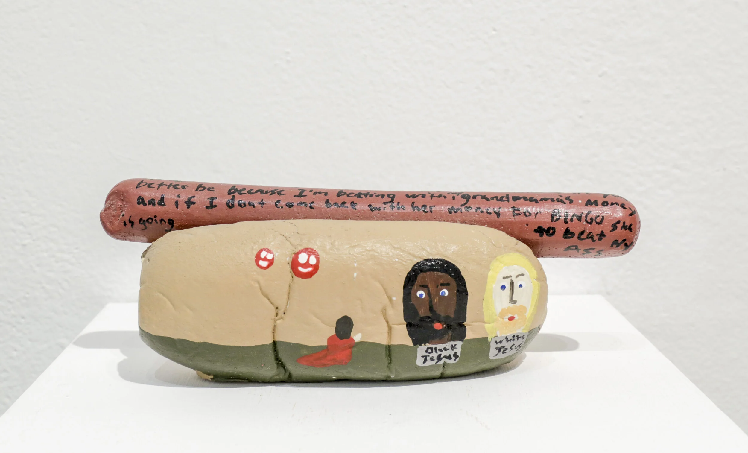  Michael Ellyson   Untitled  (Christs on Hotdog)  Plaster and paint, 2.5"x7"x3", 2008 