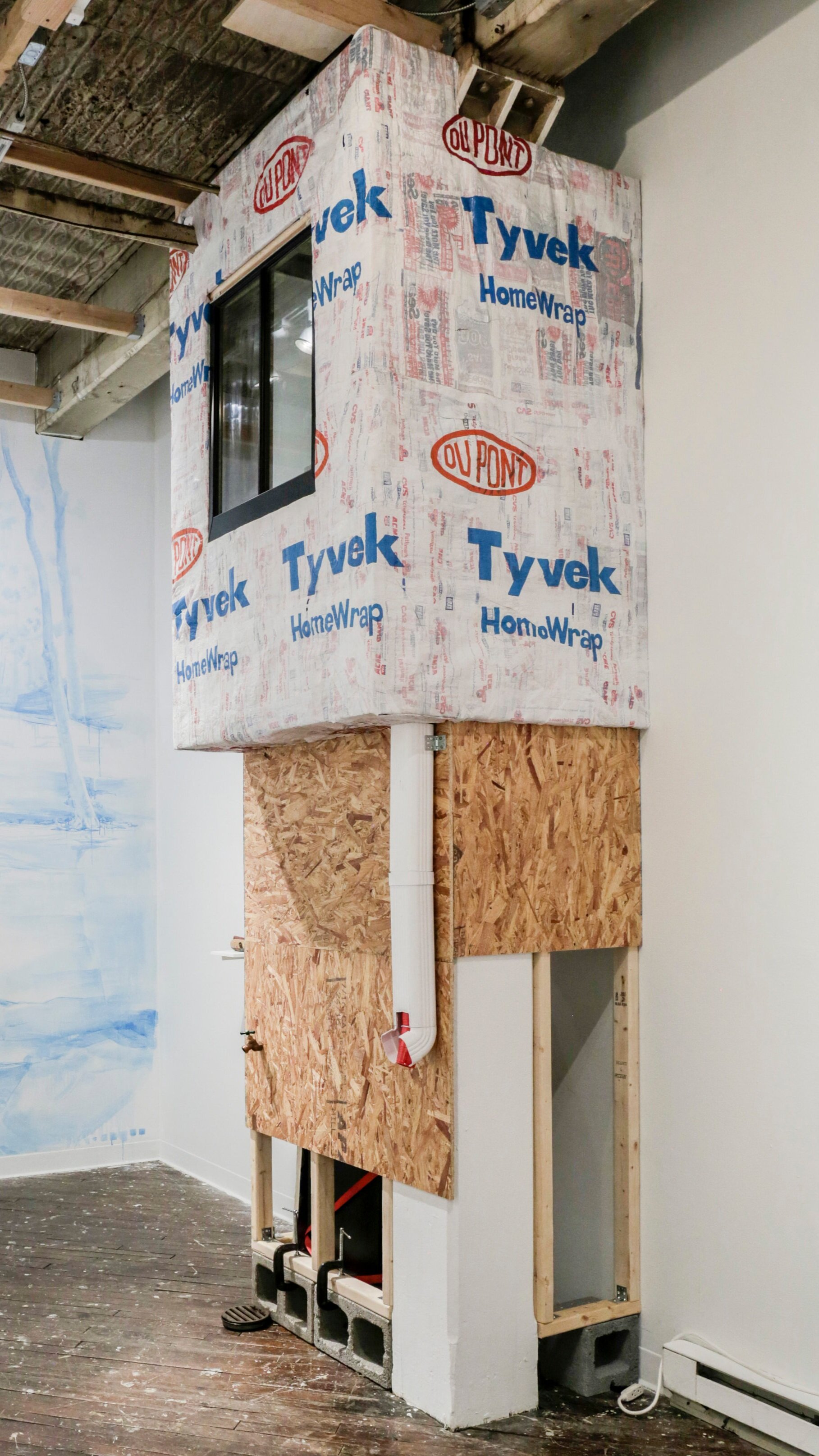  Michael Konrad   DIYvek Homewrap  (Homebrew Hose Bibb)  DIYvek fabric, lumber, OSB sheeting, cinder blocks, refrigerator home brewed beer, keg and plumbing, 144"x43"x30", 2019 