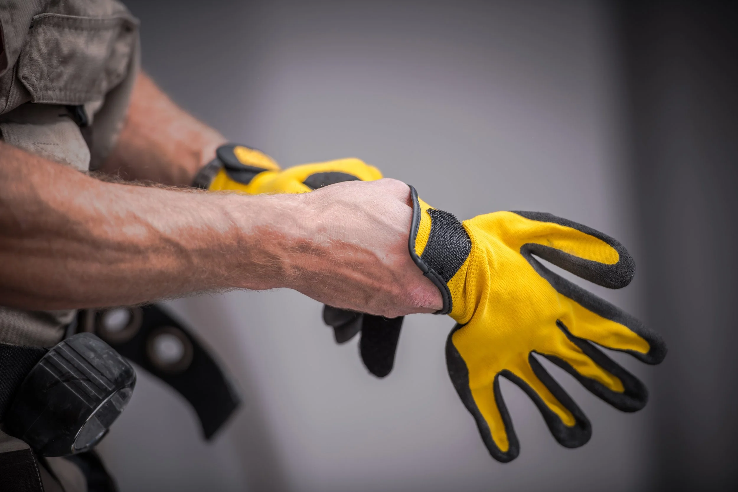 wearing-safety-gloves-PDWDQ2P.jpg
