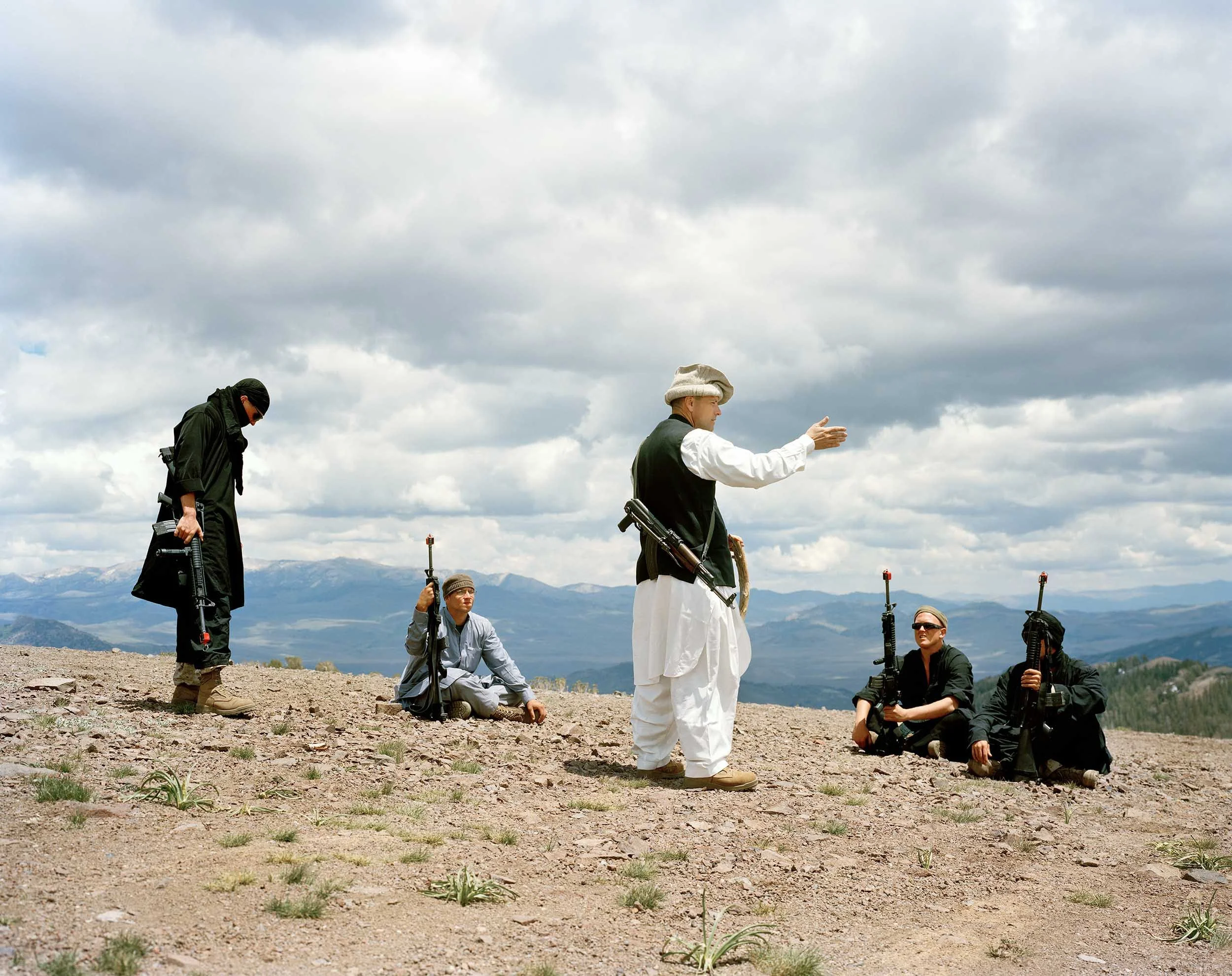 Marine Major John Cowait playing the role of a warlord holding a Taliban training camp on a remote Afghan mountaintop, 2009 (Copy) (Copy)