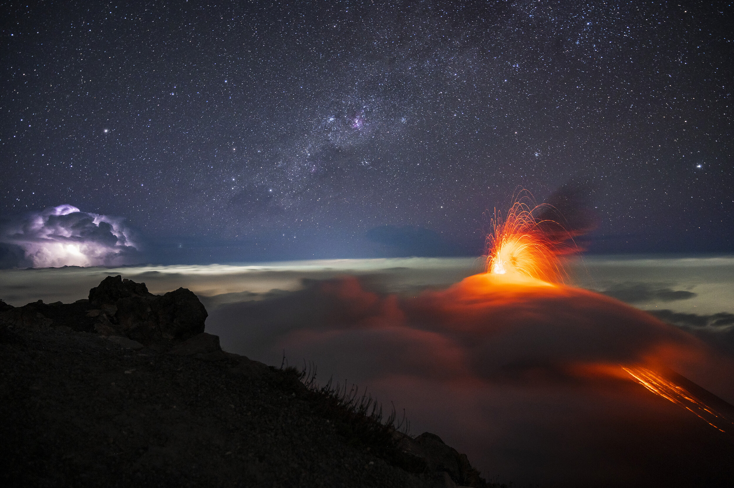 Cumulonimbus storm eruption Fuego volcano Milky Way @diegorizzophoto.jpg