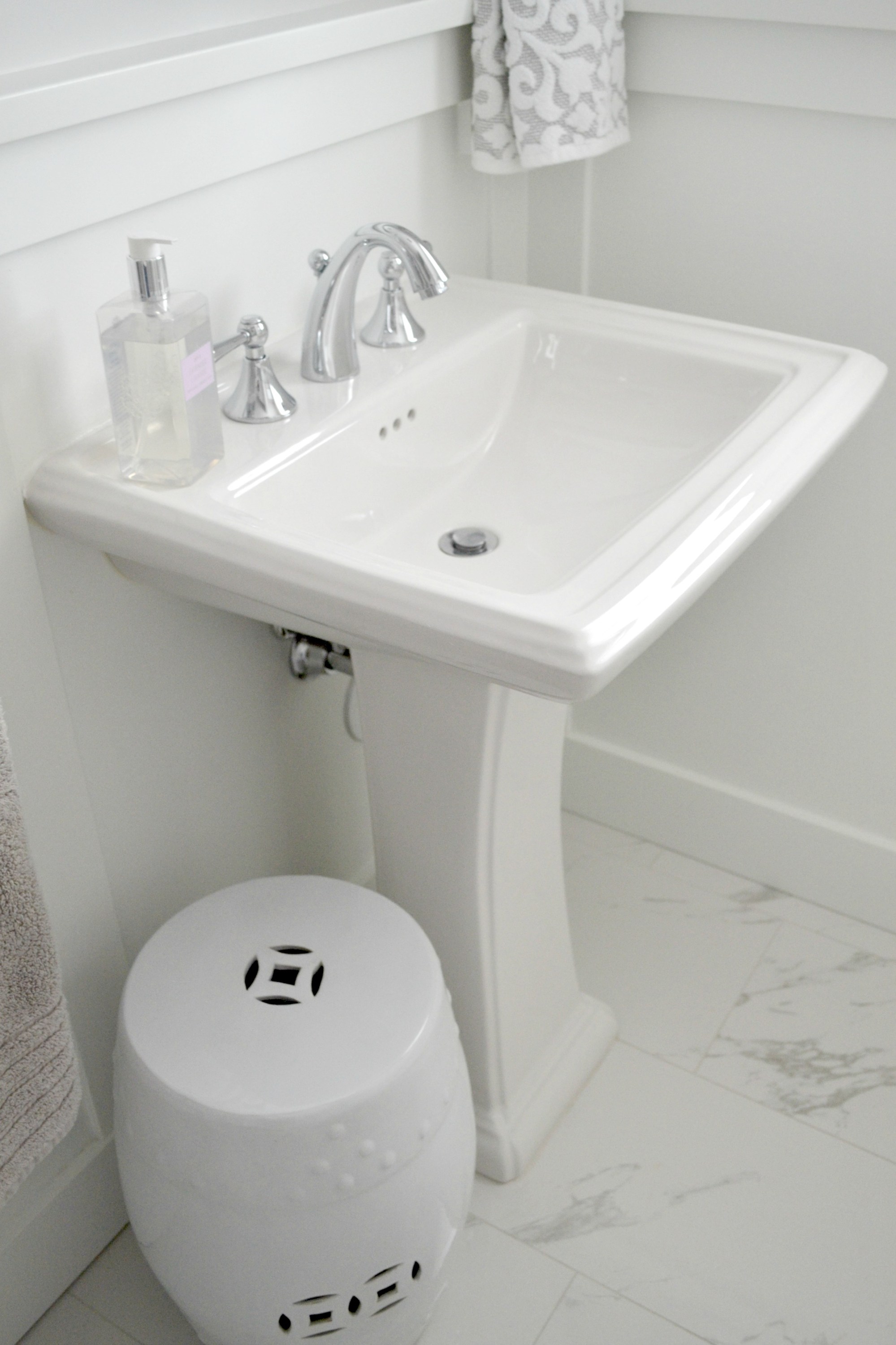 I also added wainscoting to give the room some interest to the room and it goes well with pedestal sink.