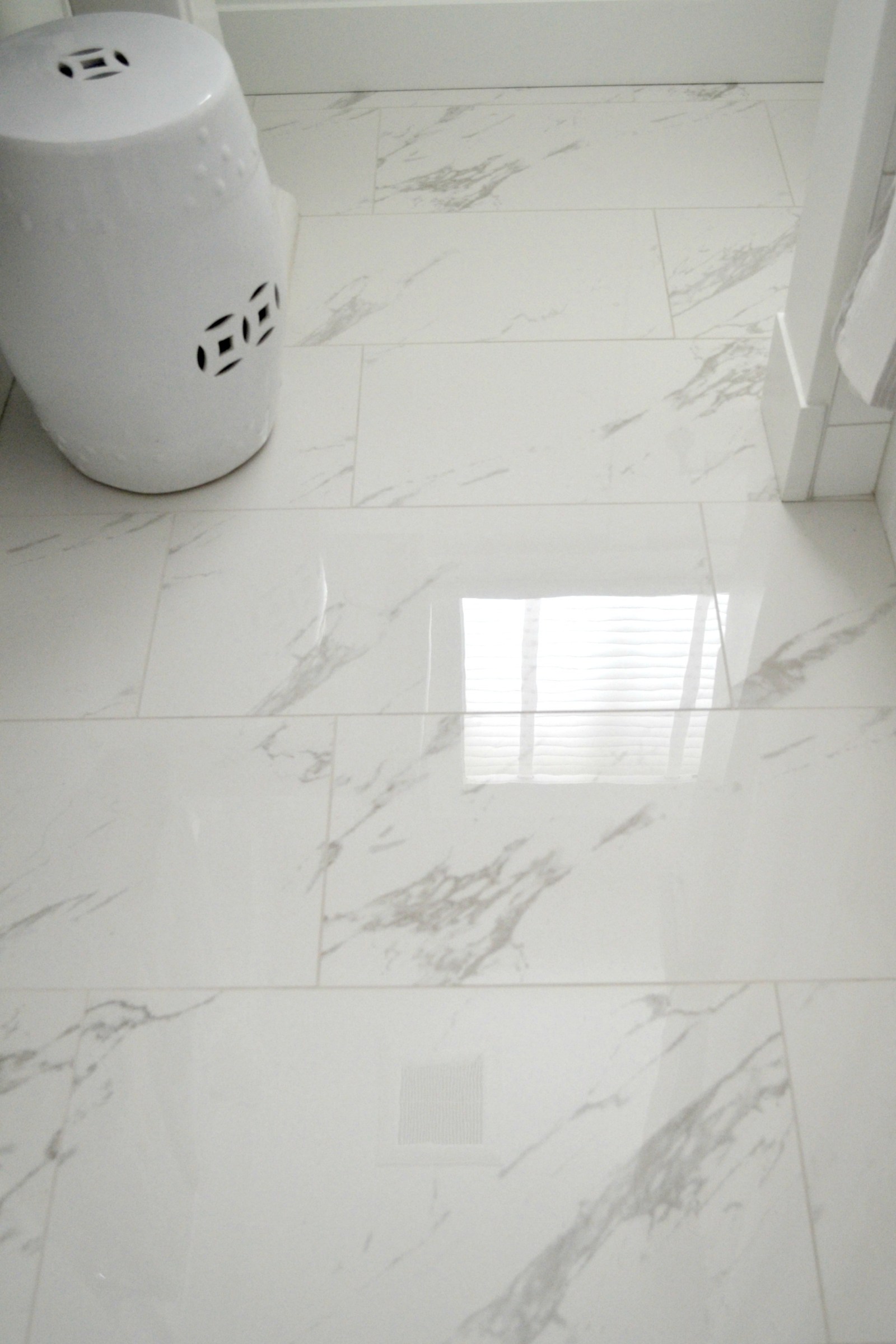 I am in love with the floor tile from Ames. I also used it in the master shower on the walls. However, if I was to redo this bathroom the only change I would make would be to use a matt finish instead of glossy. Only because it’s a pain to wash as you need to dry it right after so there are no streaks. I do love the glossy finish though. The 12″ x 24″ tiles were installed in a 1/3 pattern which I prefer personally instead of the basic brick pattern.