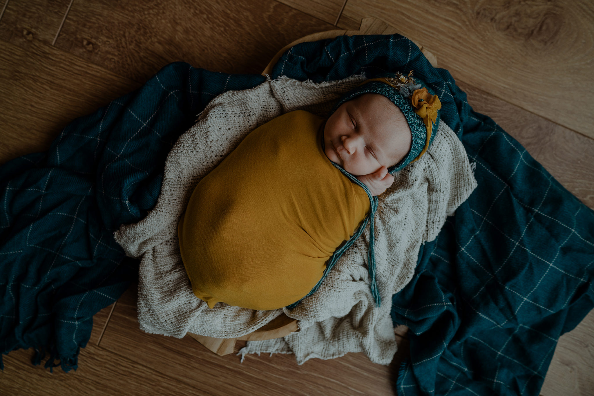 mustard navy wrap and bonnet newborn girl Newborn Photographer Belfast