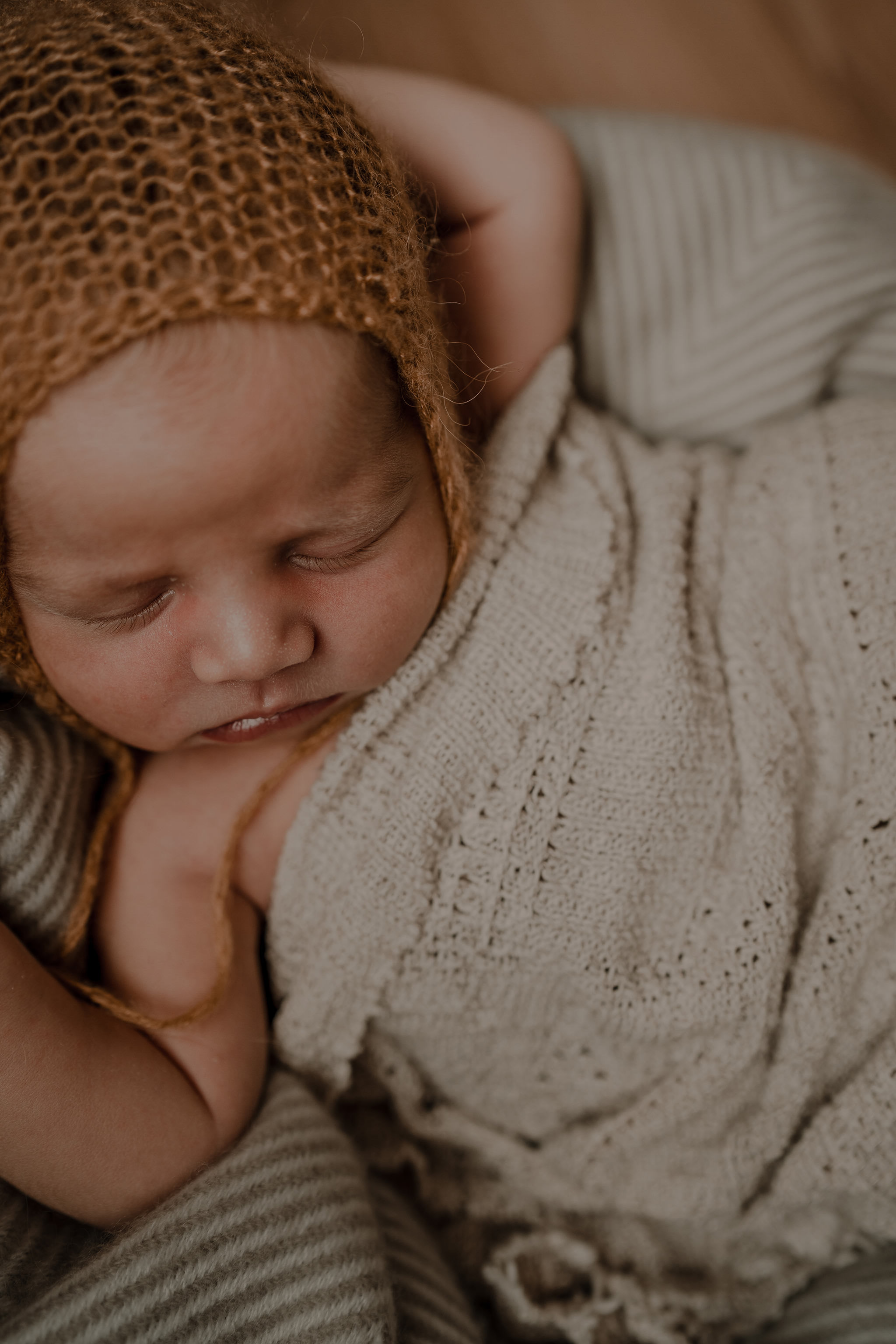 mustard and cream tones newborn baby boy in home newborn photographer Belfast