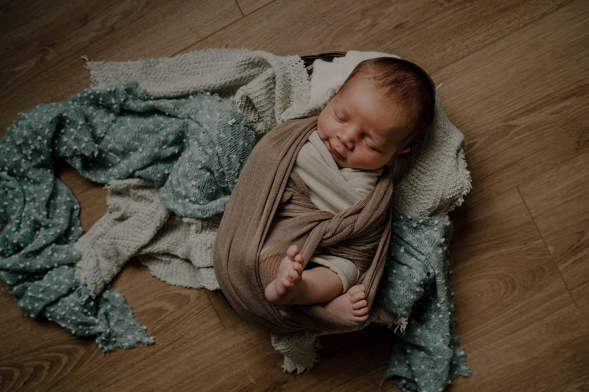 blue and neutral styling in home newborn photographer Belfast