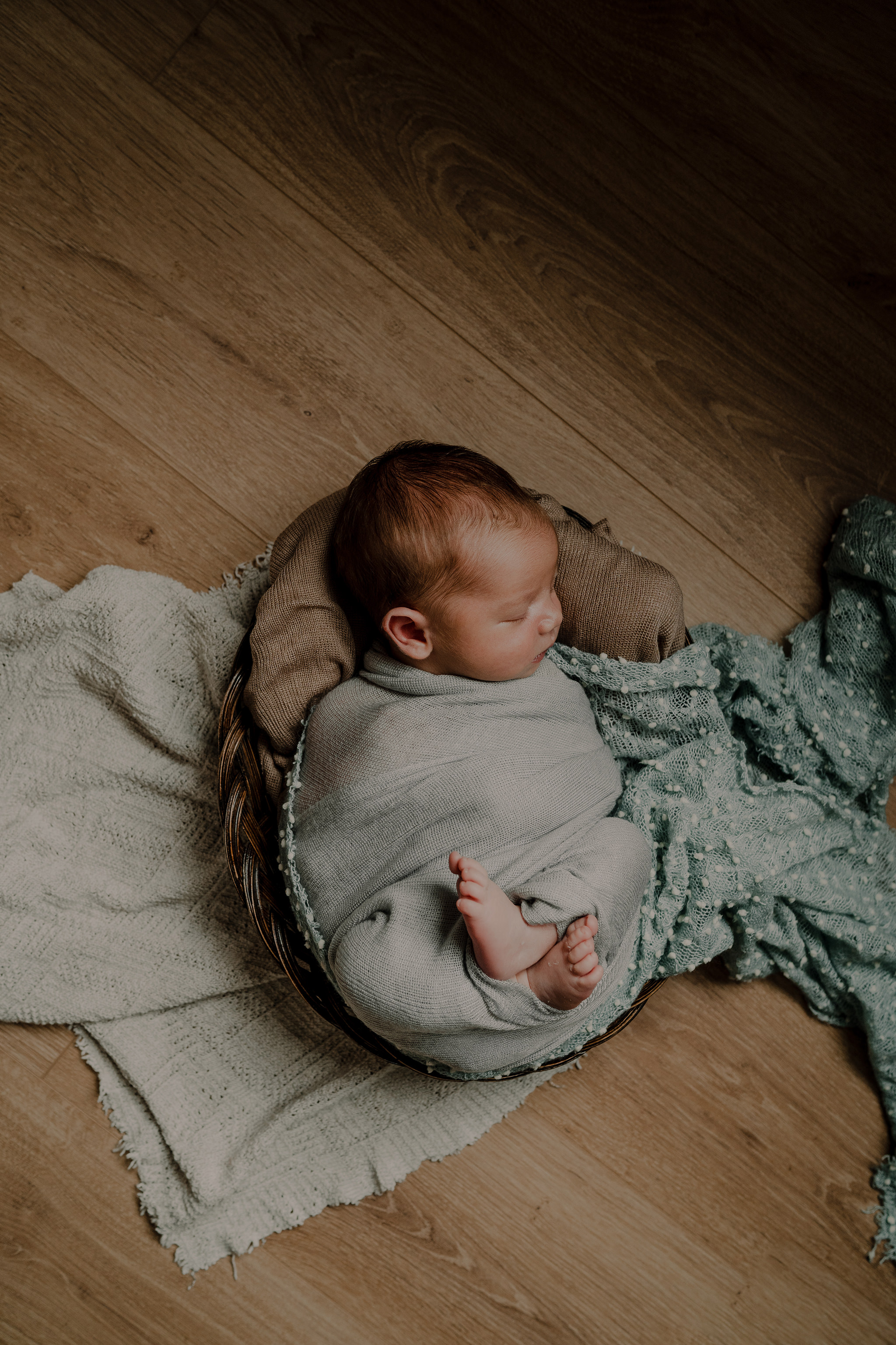 blue neutral tones in home newborn photographer Belfast