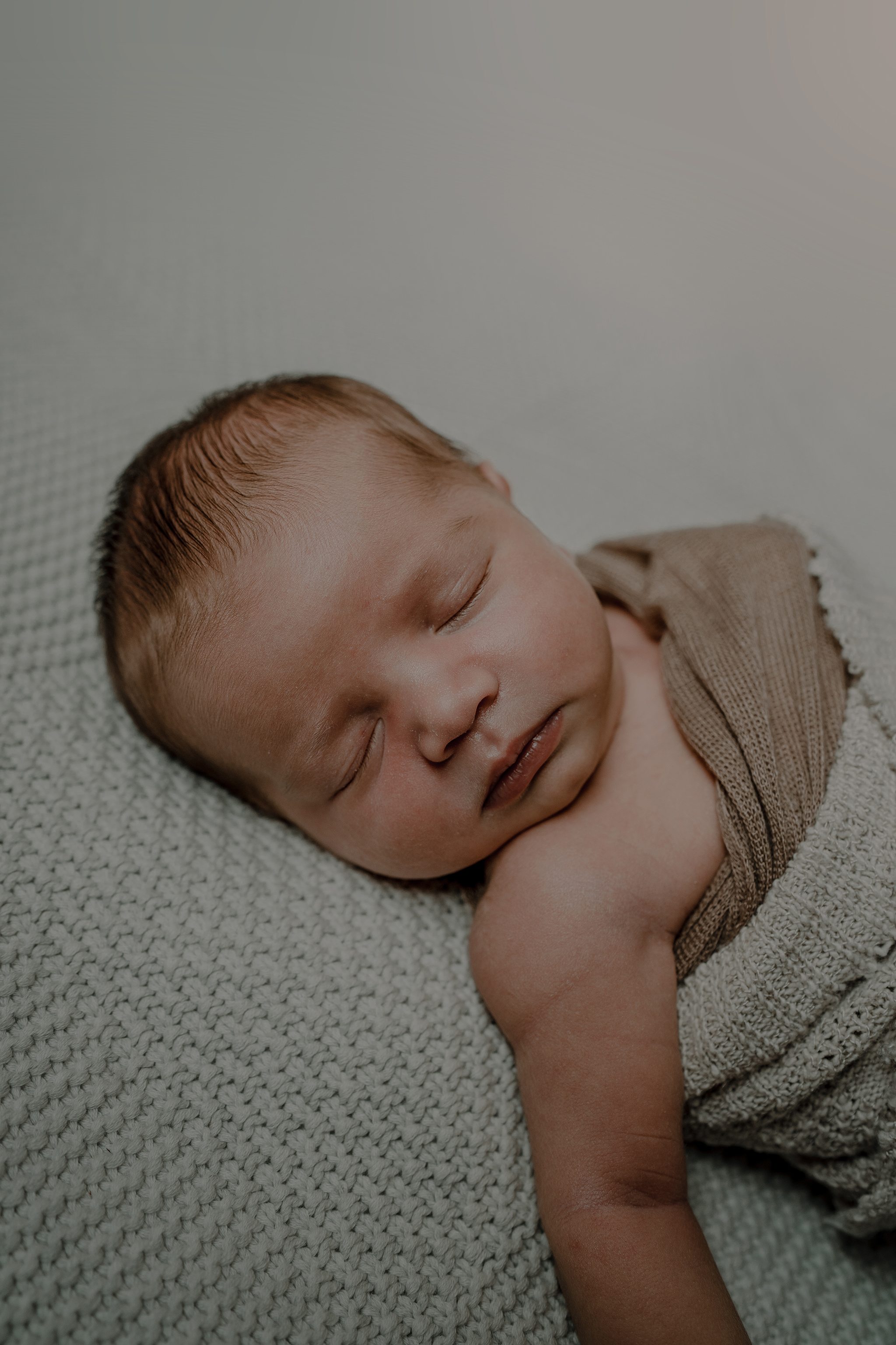 waffle knit blanket baby boy sleeping in home newborn photographer Belfast