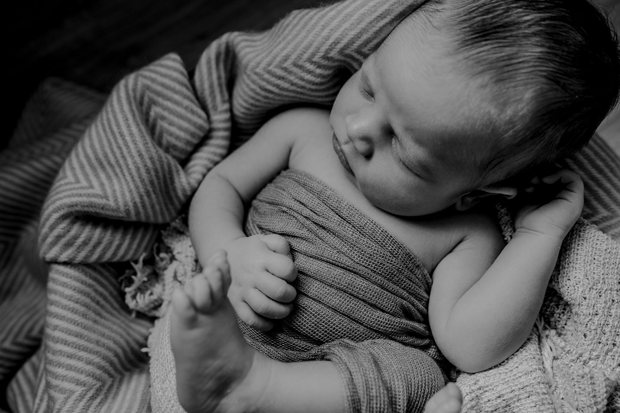 black and white baby boy blankets in home baby photographer Belfast