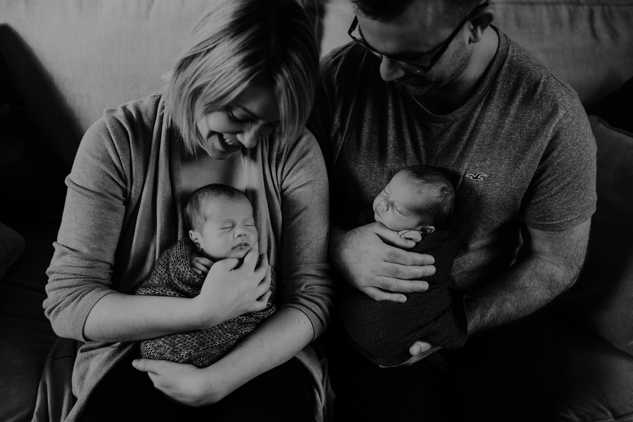 proud parents of twins creative newborn photographer Belfast