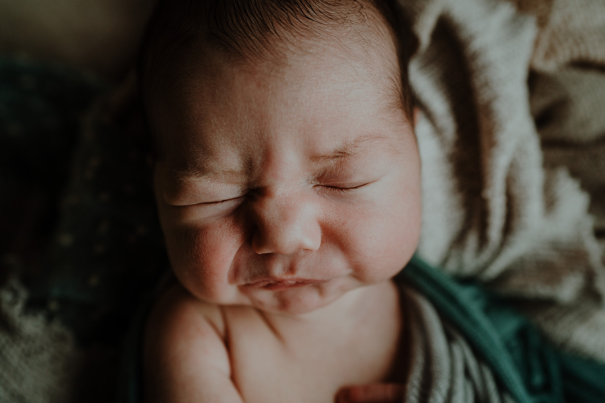 cute face expression in home Newborn Photographer Belfast