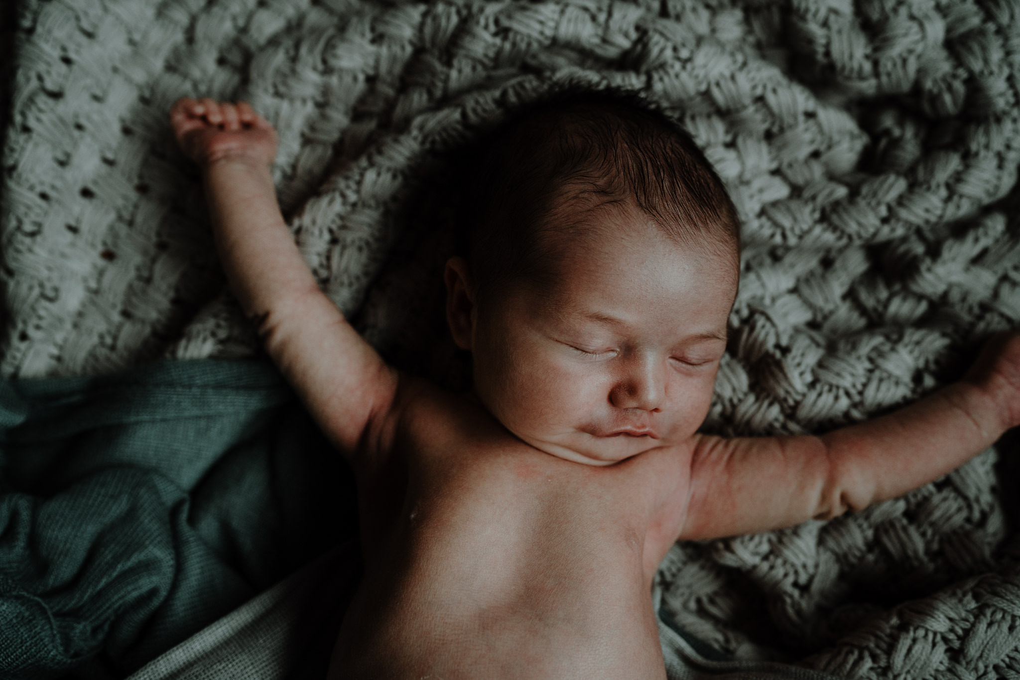 stretching-newborn-baby-during-photoshoot-belfast