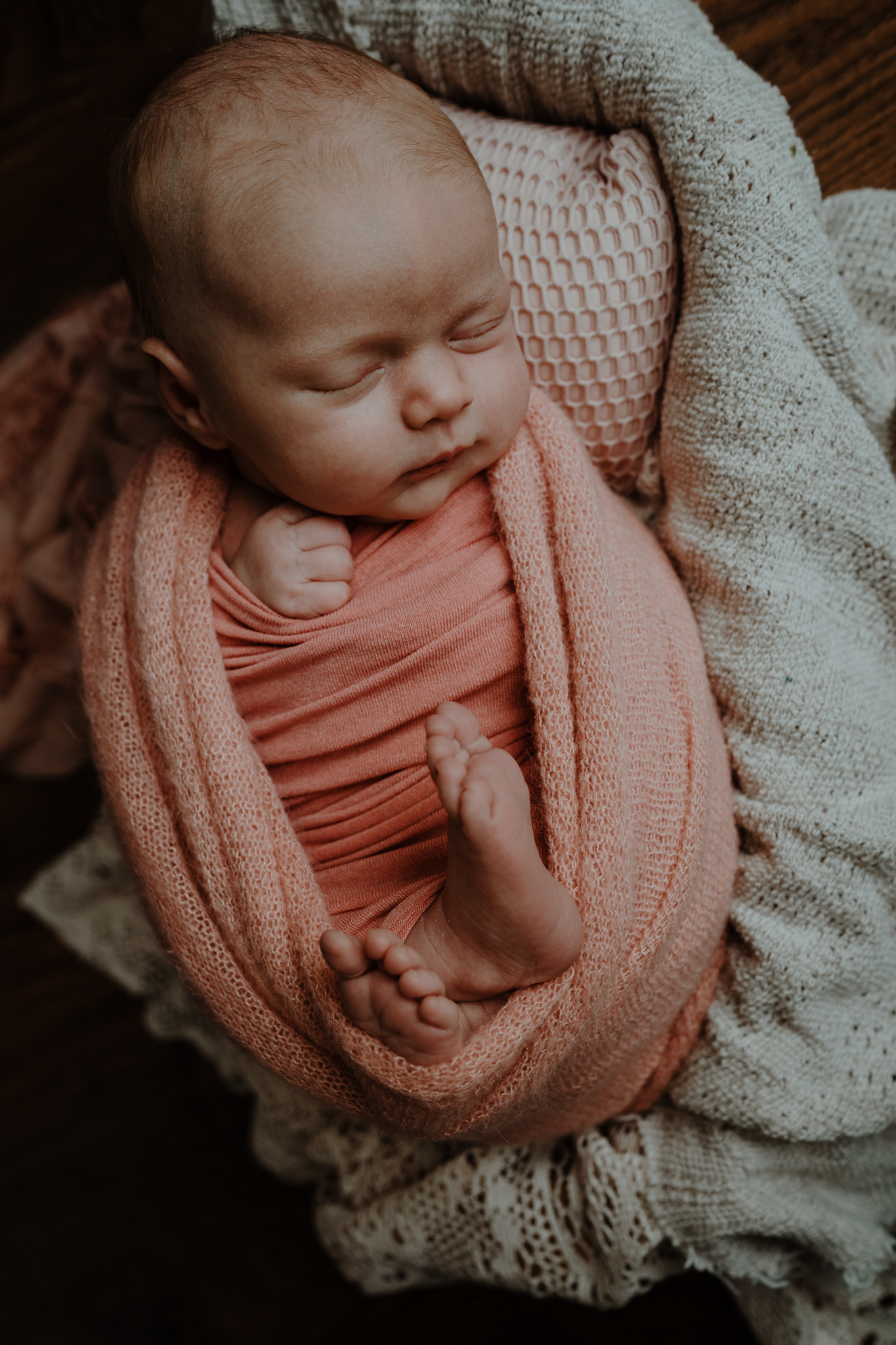 creative newborn photography northern ireland baby girl pink and blush tones newborn photographer belfast