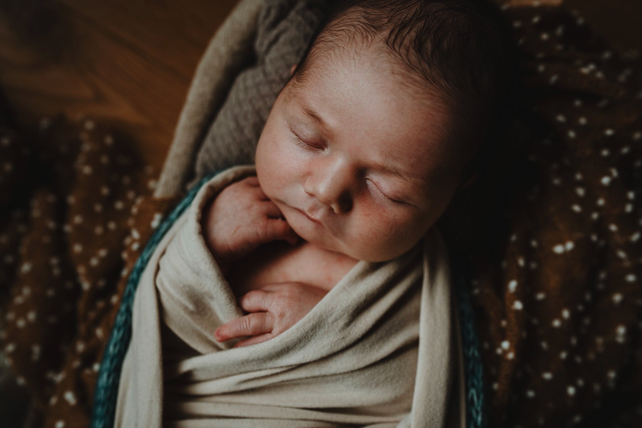 sleeping newborn baby boy cream and brown styling Newborn Photographer Belfast