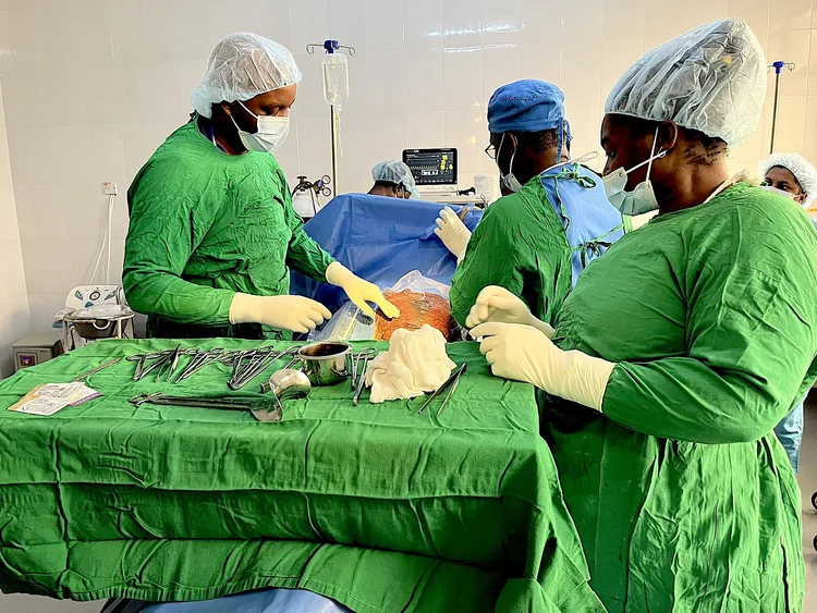 Surgical team performing a caesarean section