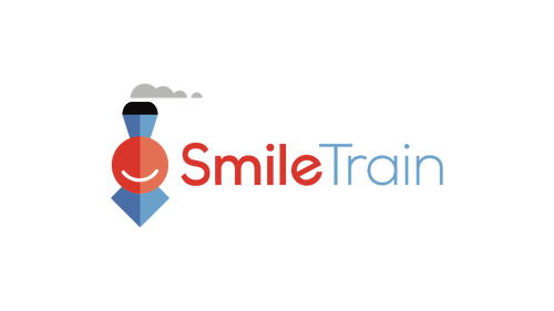Logo for SmileTrain featuring a smiling cartoon train with a red face and blue train car, with the words 'SmileTrain' in red and blue text.