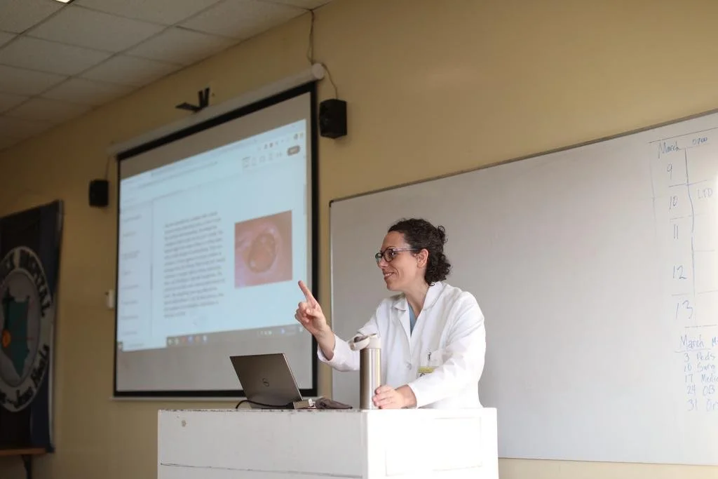 Dr. Andrea Parker teaching in a lecture room