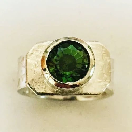 Silver and laboratory-grown green sapphire