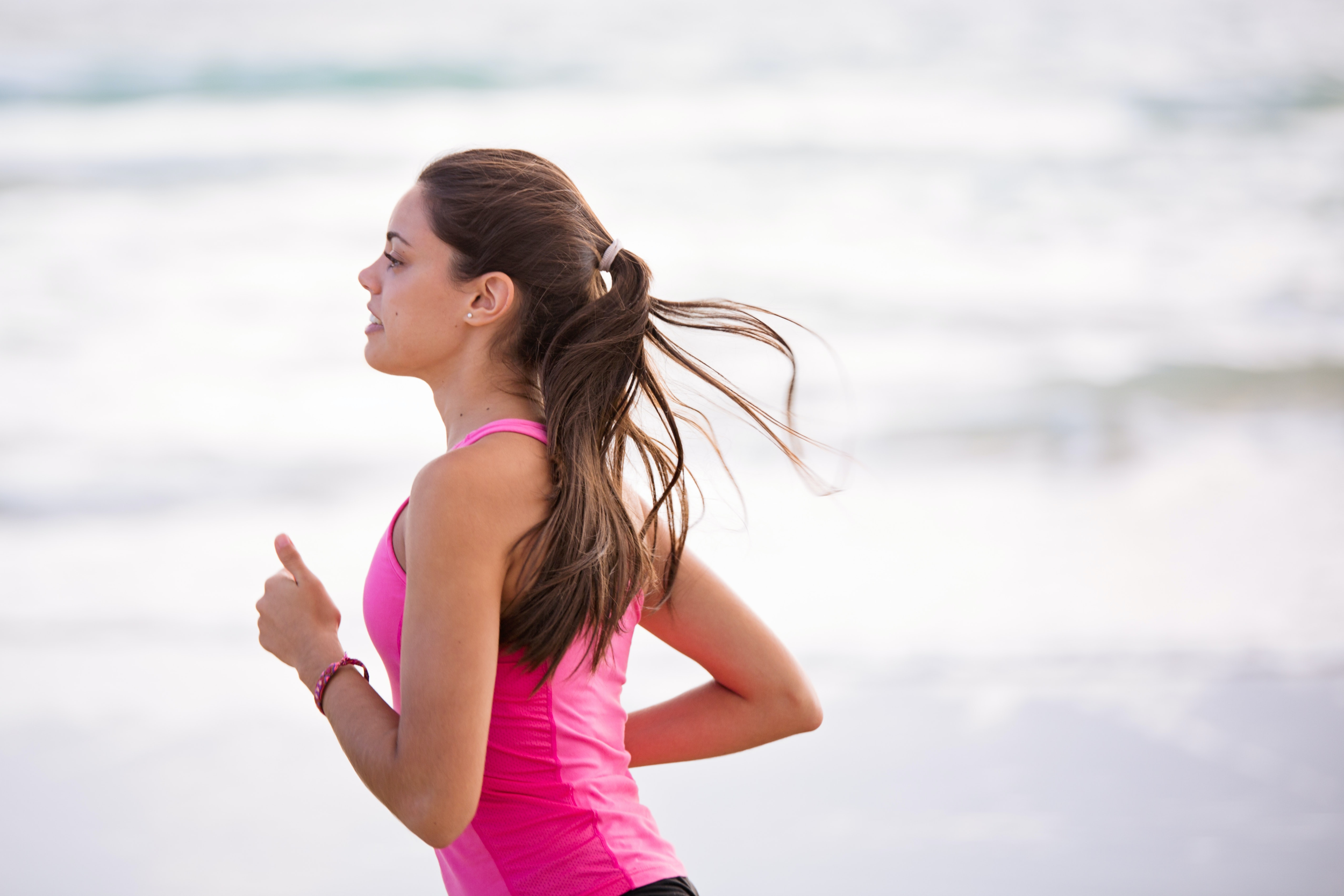 woman running on a beach