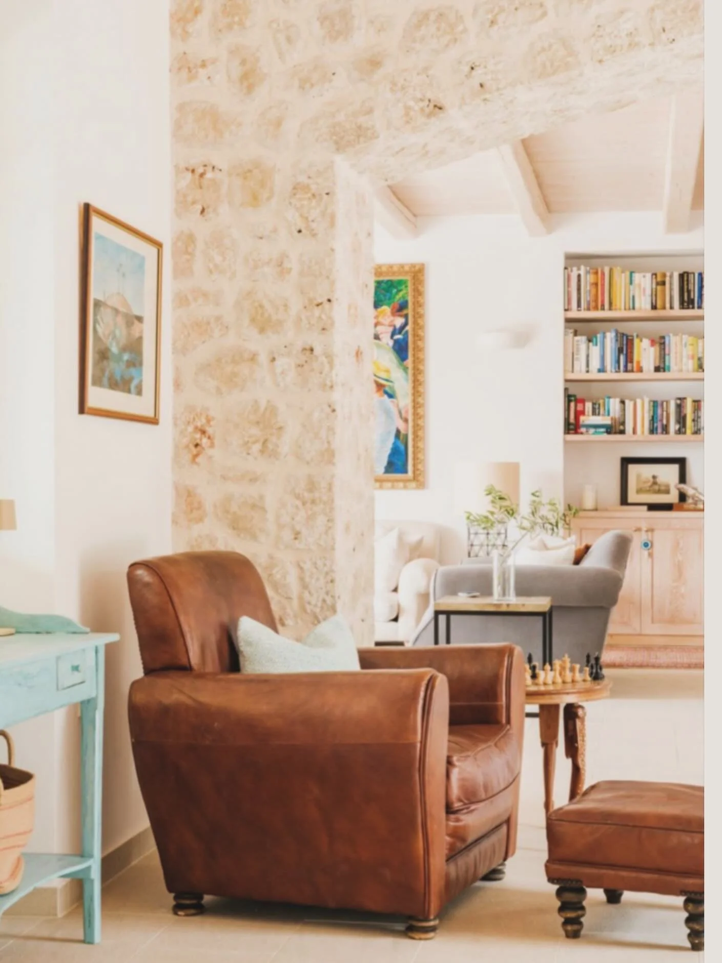 With this incessant ☔️ we&rsquo;re dreaming of Greek sunshine and summers. Here&rsquo;s a lovely shot of the open plan living space from our Greek project. The owners had an old leather chair they loved so we placed it in the kitchen - the heart of t