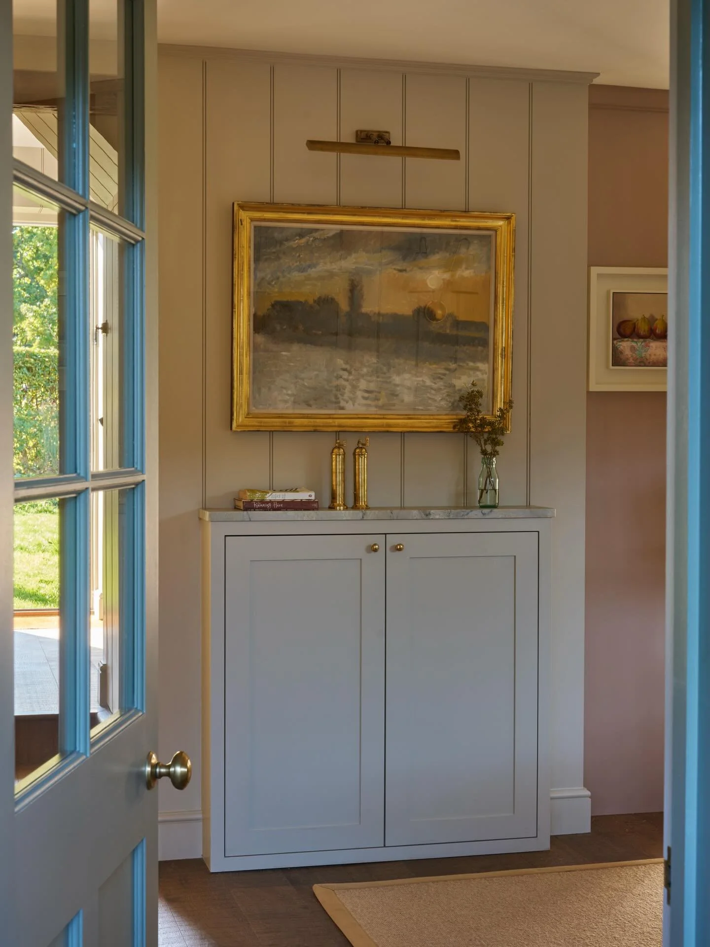 Another view of this pretty pink kitchen. Pictured is the bespoke &lsquo;kilner cupboard&rsquo;, made in the workshop to our client&rsquo;s specification. We wanted it to blend into the panelled wall behind and not intrude on the room as space was li