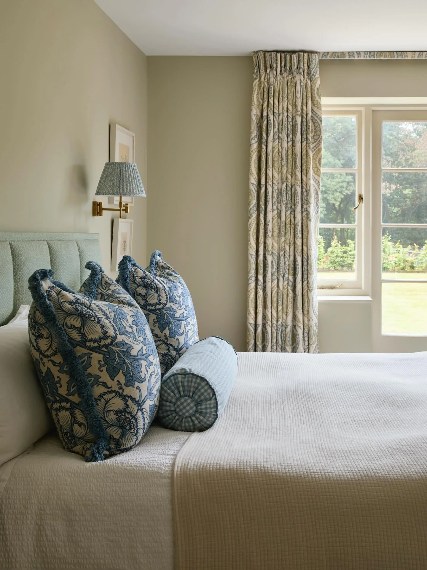 For our Hampshire project we wanted it to feel fresh but still rooted in a traditional, natural, country style. That&rsquo;s reflected in this clean-lined, light-filled, and softly layered, guest bedroom - designed to feel crisp yet classic, and to s