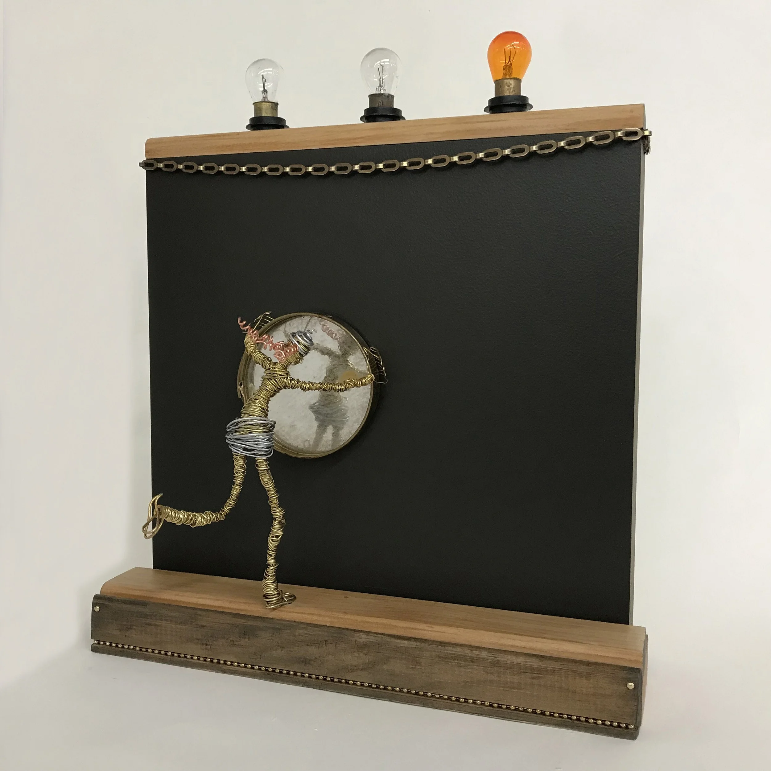 Enlightenment Assemblage Wall Sculpture 15 × 13 × 7” wire, wood, brass, bulbs, vintage mirror