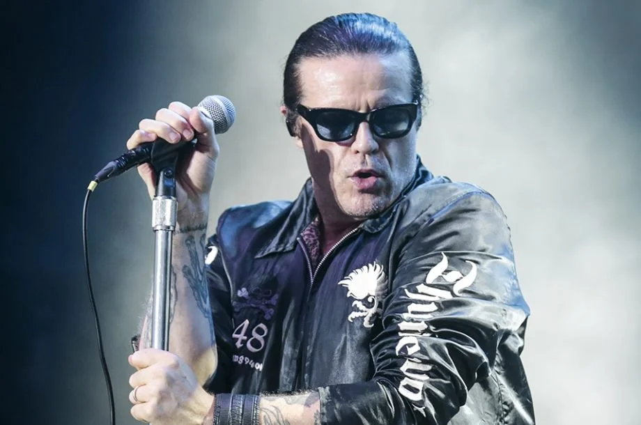 Ian Astbury from The Cult dives off stage to save an audience member from a chokehold