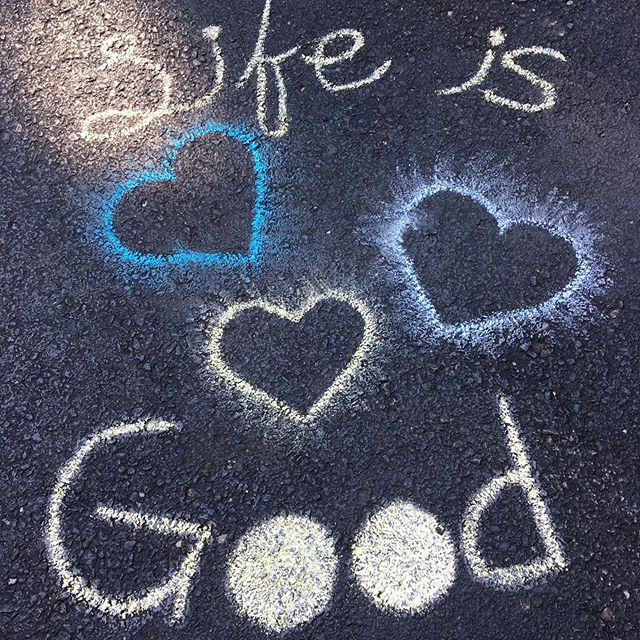 It was a beautiful day at the #ithacafarmersmarket. I came home to find my daughter had drawn this on the driveway. 🙂 thank you @raineethayer