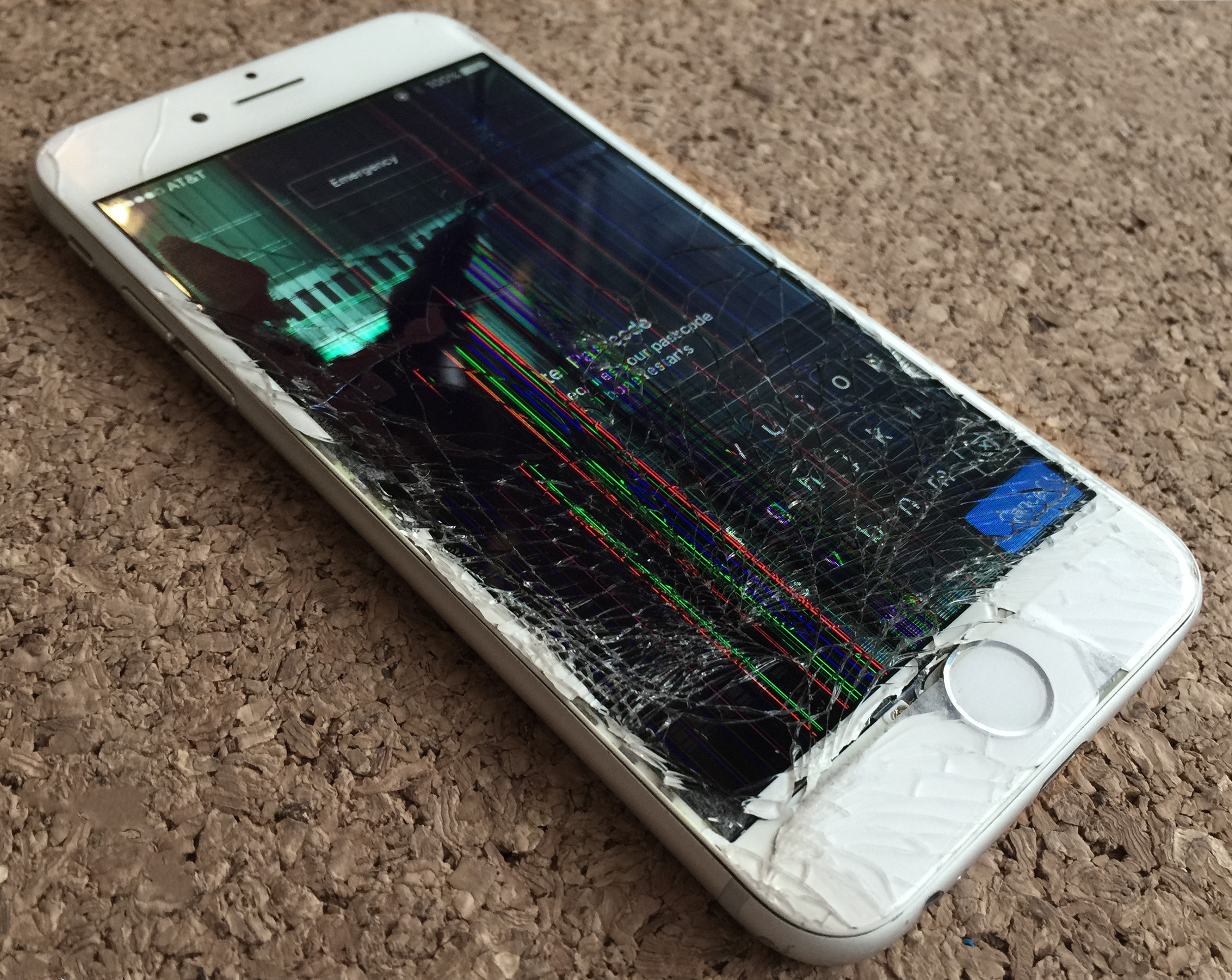 AT&T-iPhone-7-with-Cracked-Glass-Broken-LCD-Screen-Colored-Lines.jpg