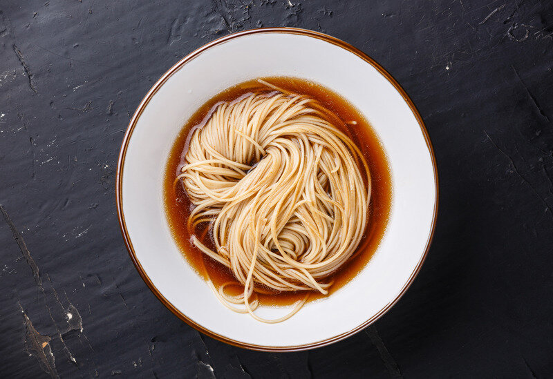 Canva - Asian Ramen Noodles with Broth in Bowl on Dark Background.jpg