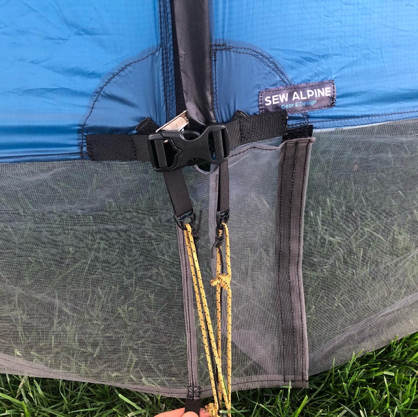 Bug mesh skirt and buckle closure