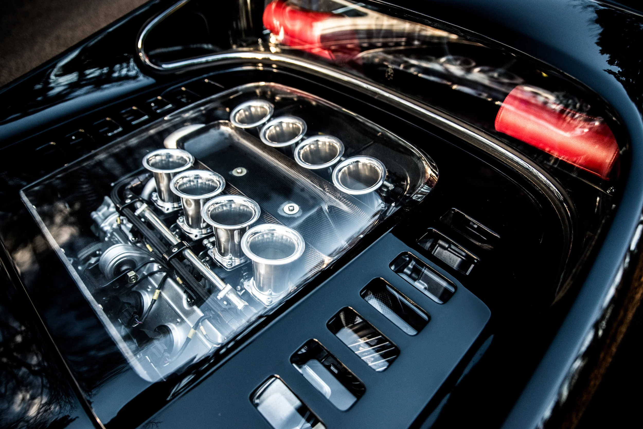 Unique and bespoke perspex engine cover to show off the beautifully modified 3.6 litre Ferrari V8 engine with 400bhp. Photo by JAYSON FONG